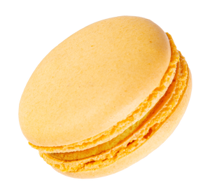 A vibrant orange mango macaron with a tropical flavor